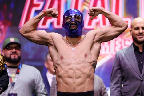Teofimo Lopez flexing at a weigh-in.