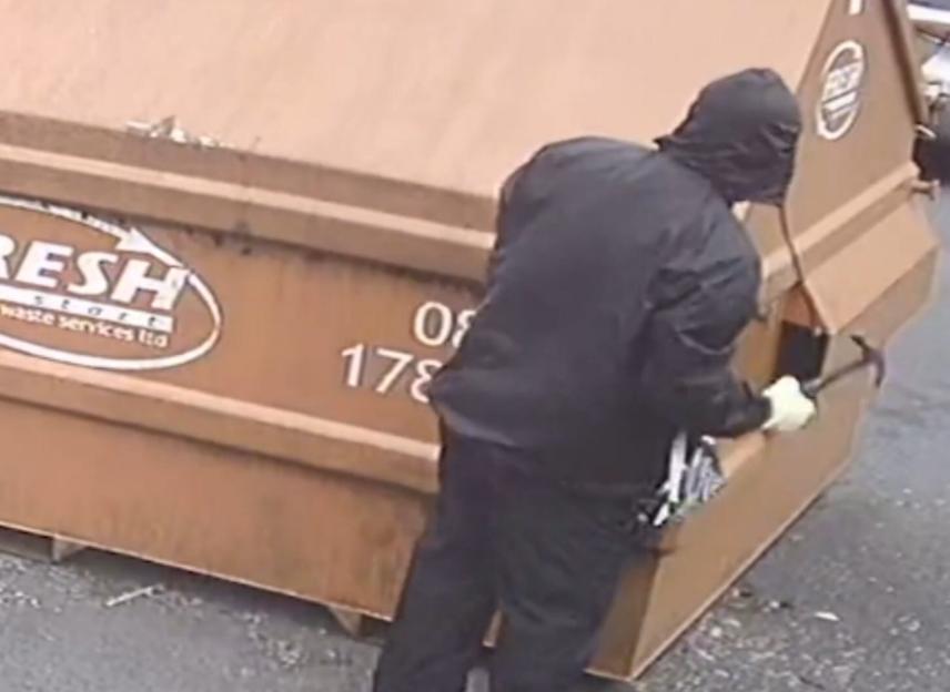 Surveillance image of Vincent Foley attempting to rob a Greggs Bakery.