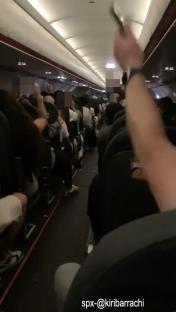 Video of rowdy passengers on an easyJet flight.