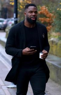 Joleon Lescott and Victor Anichebe arriving at a memorial service.
