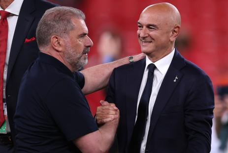 Daniel Levy and Ange Postecoglou shaking hands.