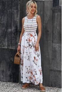 Woman in a floral maxi dress.