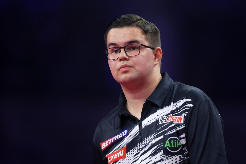 Gian van Veen of the Netherlands at a darts match.