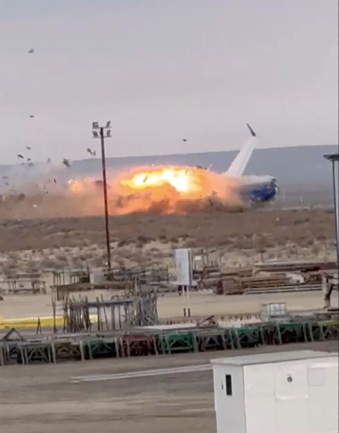 An Azerbaijan Airlines plane crashing and burning.