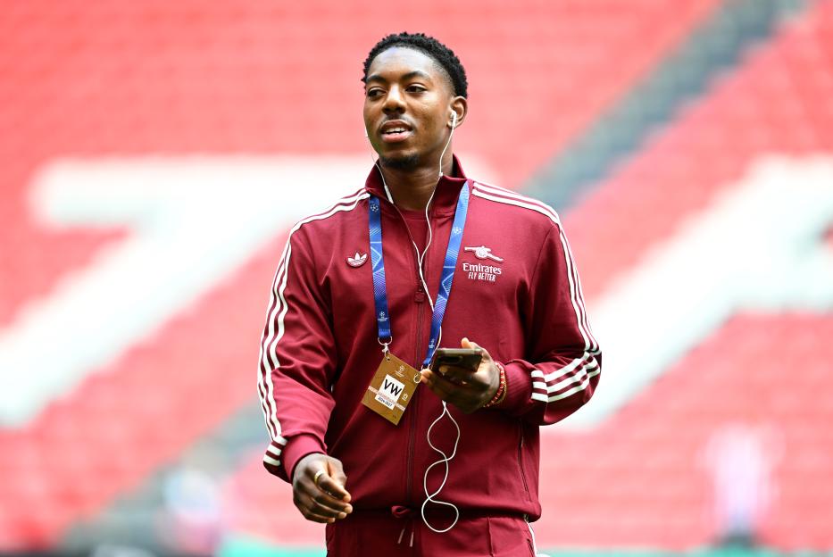 Myles Lewis-Skelly of Arsenal inspects the pitch.