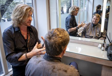 Mel Stride getting a haircut and discussing national insurance with hairdressers Nicky and Michael Clarke.