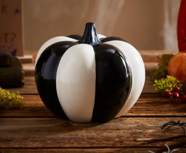 Black and white striped ceramic pumpkin.