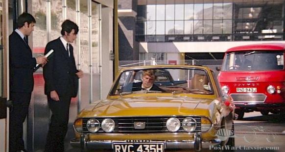 A 1977 Triumph Stag in a James Bond-style scene.