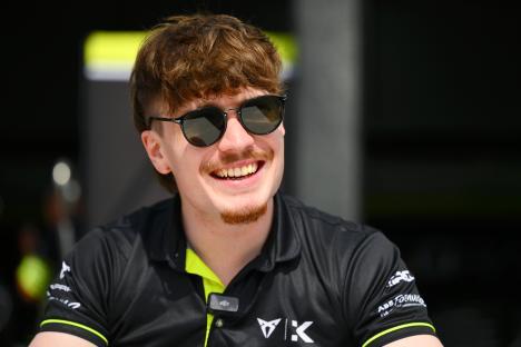 Dan Ticktum smiling and wearing sunglasses.