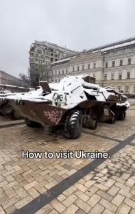 Snow-covered military vehicle in Kyiv, Ukraine.