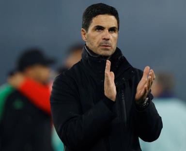 Mikel Arteta, Arsenal manager, clapping.