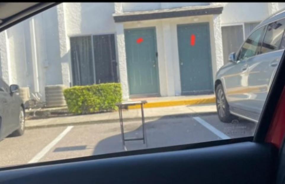 Small table in parking spot reserving space.