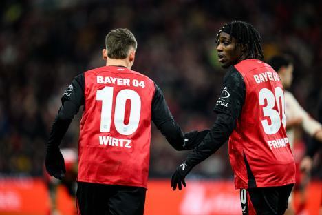 Florian Wirtz and Jeremie Frimpong of Bayer Leverkusen.