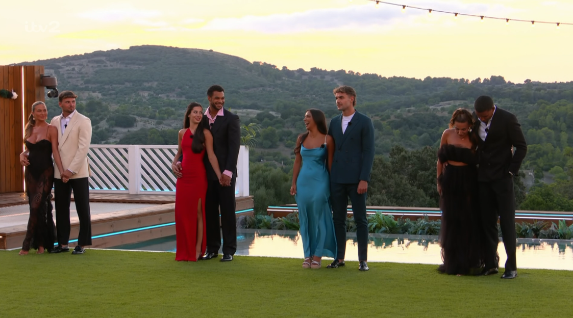 Screenshot of four couples standing together outdoors at sunset.