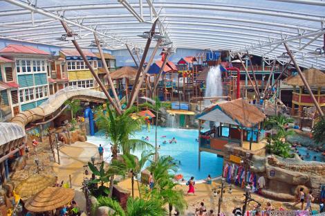 Alton Towers Waterpark indoor pool area with slides and play structures.