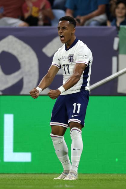 Omari Hutchinson of England celebrates scoring a goal.