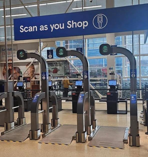 Tesco self-checkout scanners.