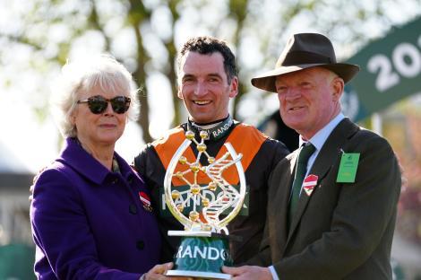 Jockey Patrick Mullins with his mother and father after a race win.