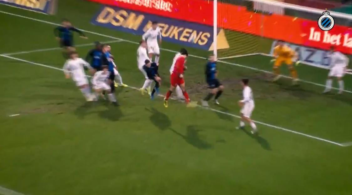 Soccer game: a late goal being scored.