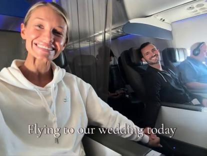 Couple on a plane flying to their wedding.