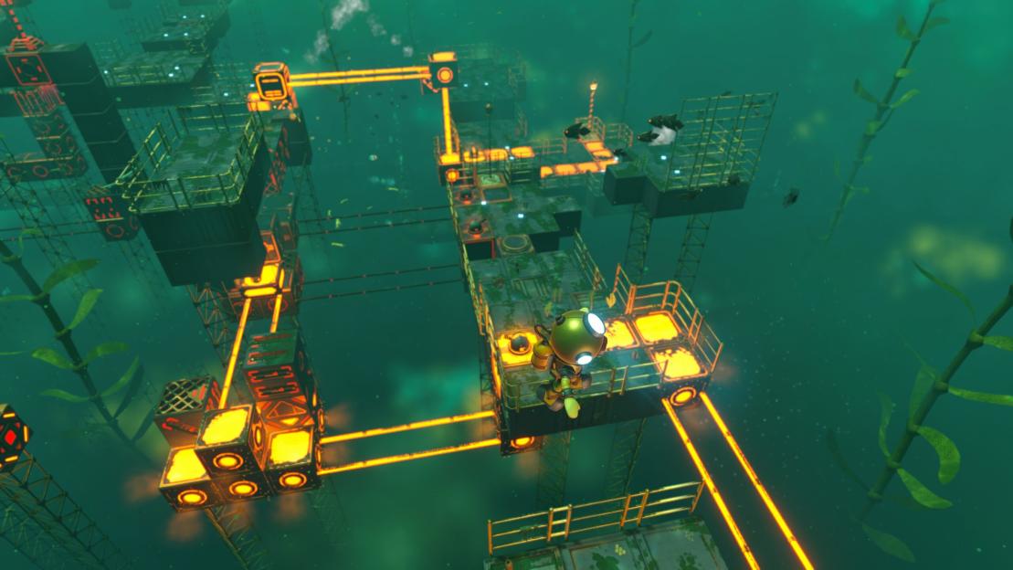 Screenshot of underwater game level with glowing orange pipes and a small submersible robot.