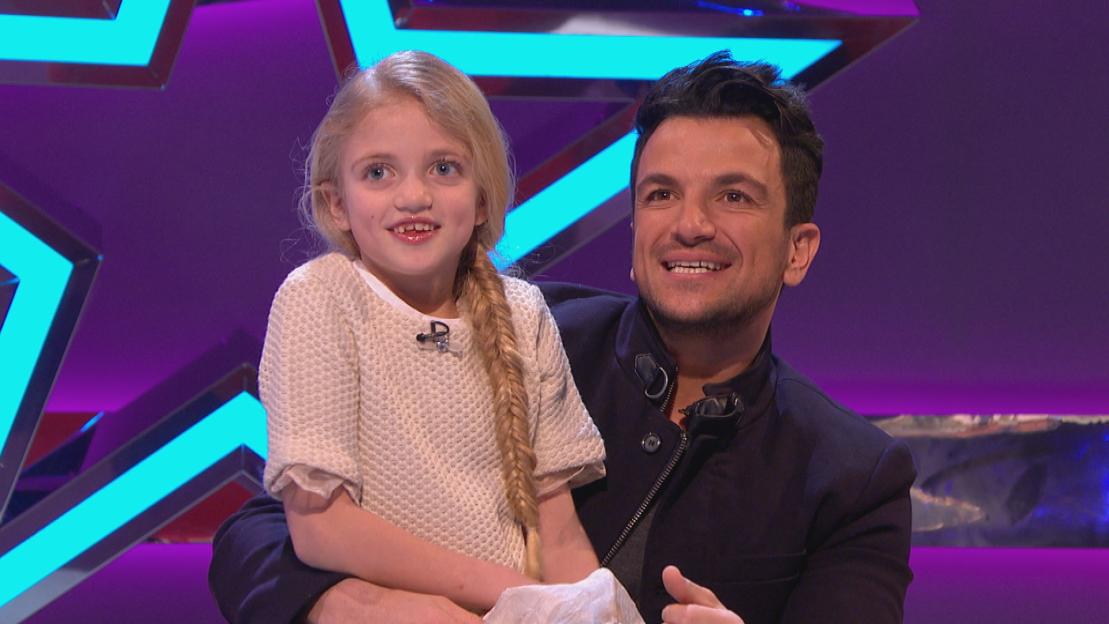 Peter Andre and his daughter Princess on a TV show.