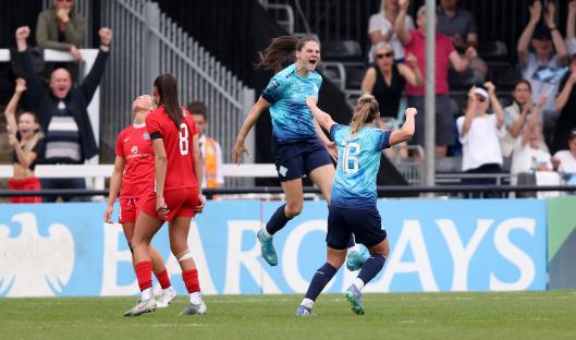 Isobel Goodwin of London City Lionesses celebrates scoring a goal.