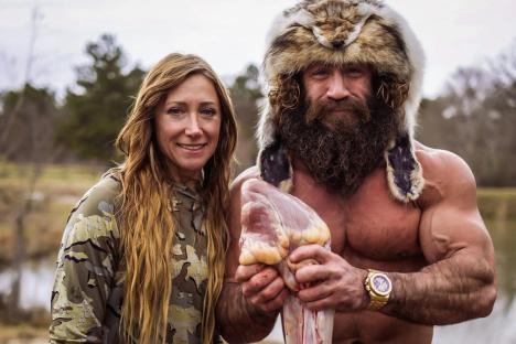 Brian Johnson, known as the Liver King, and a woman holding raw meat.