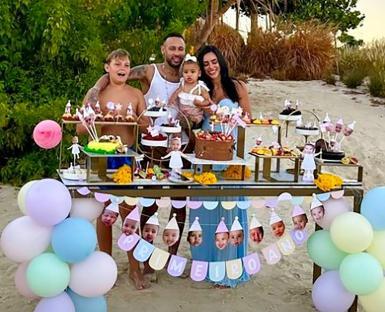 Mavie's first birthday beach celebration with family.