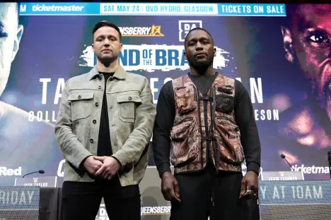 Two boxers at a press conference.