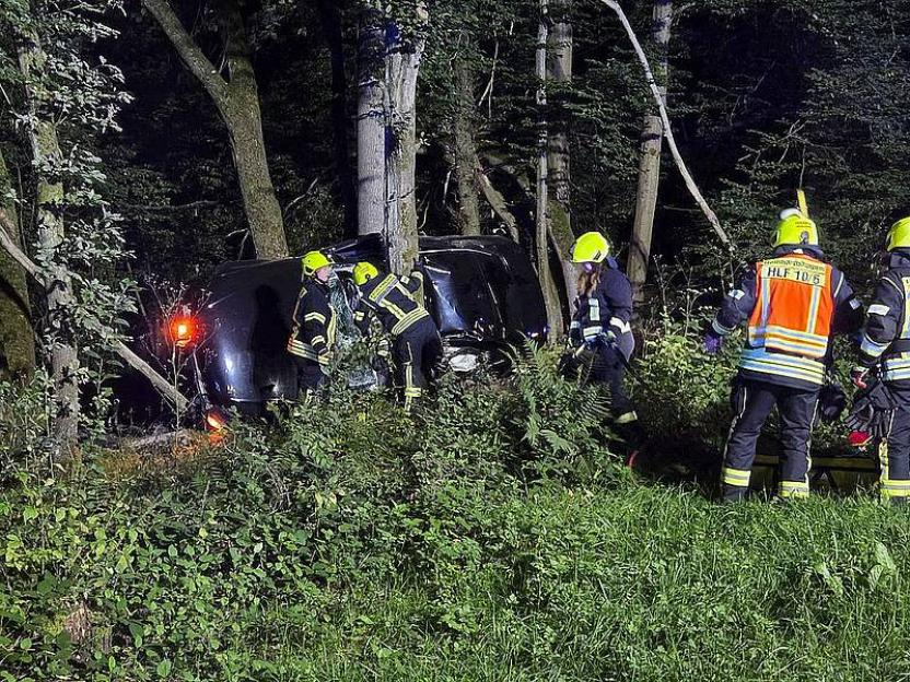 Emergency responders at a fatal car crash site.