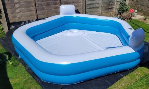 Inflatable pool in a garden.