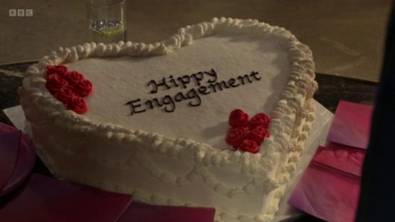 Heart-shaped engagement cake with