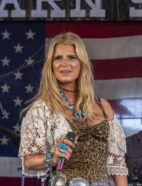 Jessica Simpson performing at a music festival.