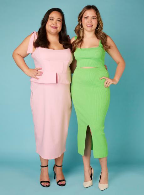 Michelle (mother) in a pink outfit and Bella Lopez (daughter) in a green outfit.