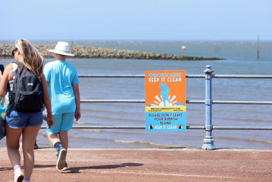 Keep Morecambe clean sign by the sea.