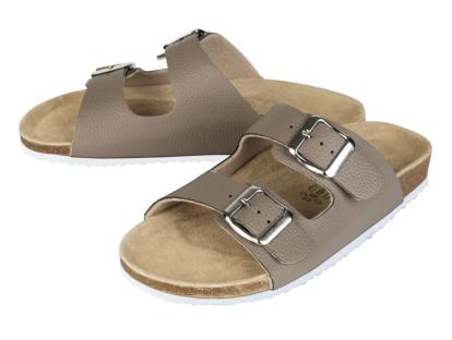 Pair of taupe sandals with double buckles.