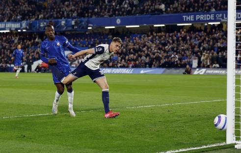 Micky van de Ven of Tottenham Hotspur shoots at goal.