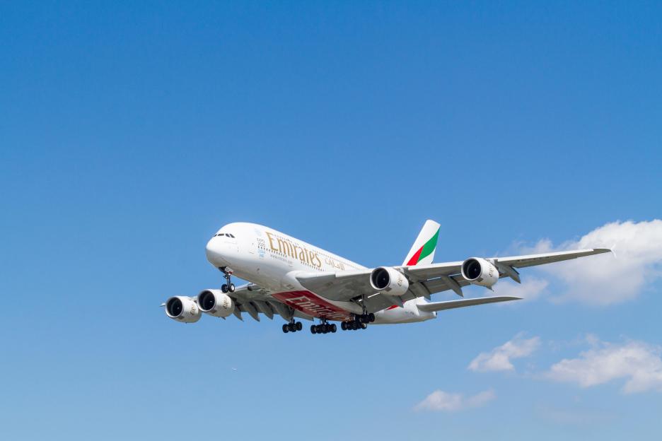 Emirates Airbus A380-861 plane landing.