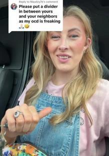 Woman giving thumbs up, responding to a comment about garden dividers.