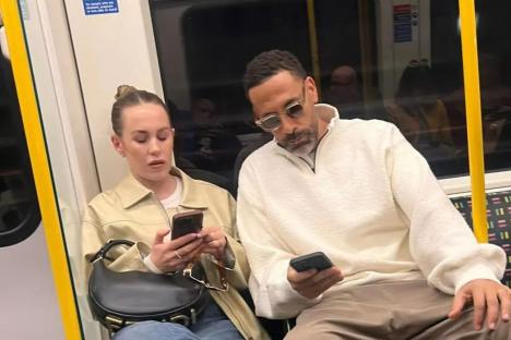 Tube passengers gobsmacked as they spot legendary millionaire footballer and his wife after shopping spree