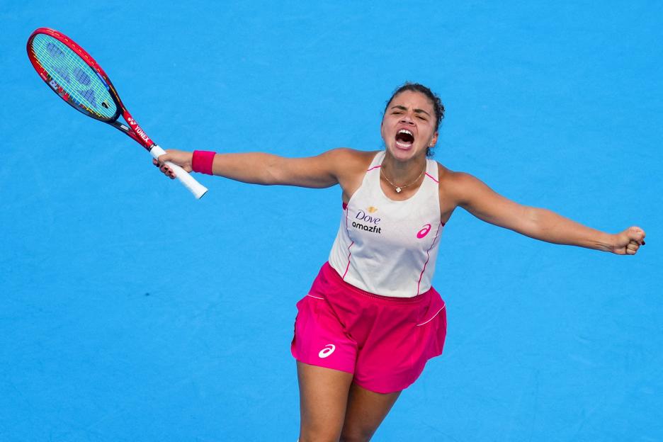 Jasmine Paolini celebrates a tennis victory.