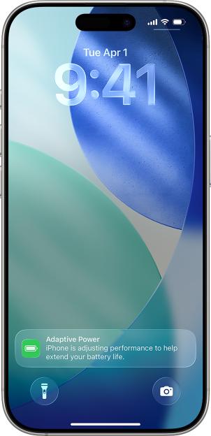 iPhone Lock Screen with a notification about Adaptive Power adjusting performance to extend battery life.