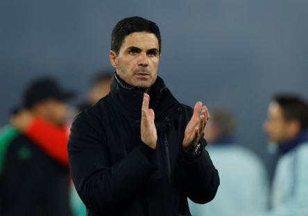 Mikel Arteta, Arsenal manager, applauding.