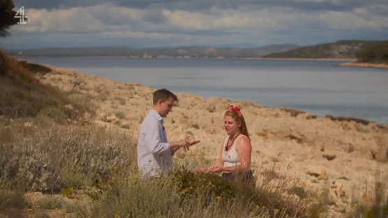 Charlotte and Jason having an awkward encounter on a beach in the Virgin Islands.