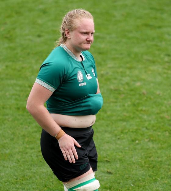 Aoife Wafer of Ireland tackled by Lea Champon of France during a rugby match.