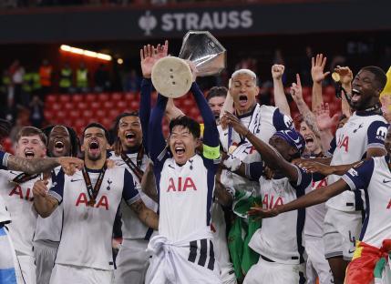 Tottenham Hotspur players celebrating their Europa League victory.