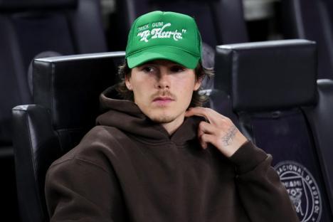 FORT LAUDERDALE, FLORIDA - OCTOBER 25: Cruz Beckham, son of David and Victoria Beckham, looks on prior to the match between Inter Miami and Atlanta United during round one of the 2024 MLS Playoffs at Chase Stadium on October 25, 2024 in Fort Lauderdale, Florida. (Photo by Rich Storry/Getty Images)