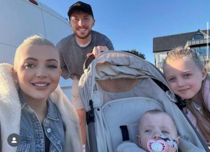 Family photo of Atlanta McIntyre with her baby Poppy and two other children.
