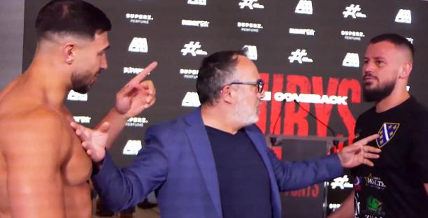 Tommy Fury shoved by opponent Kenan Hanjalic at a press conference.